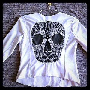 White blouse with skull on the back